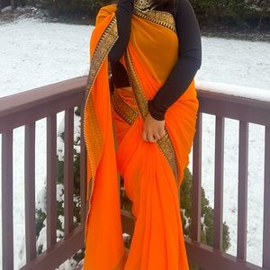 Neon orange georgette saree